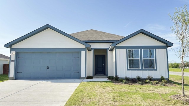 3600 Skylane Ave, Corsicana, TX 75110 - view of front of house featuring driveway, a front lawn, a garage, and board and batten siding