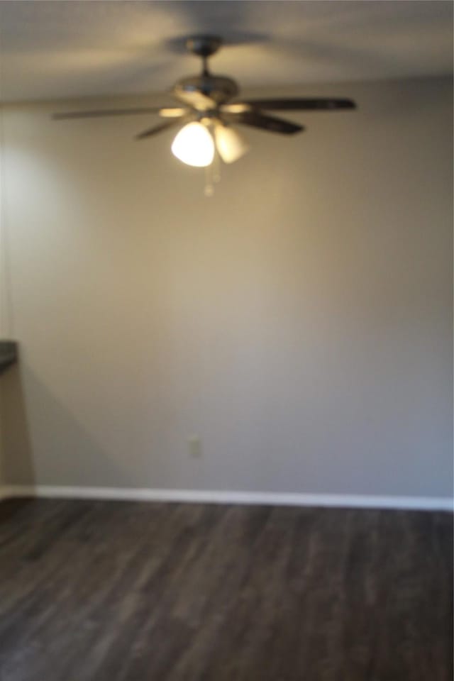 5540 Boca Raton Blvd Unit 174, Fort Worth, TX 76112 - unfurnished room with ceiling fan and dark wood finished floors