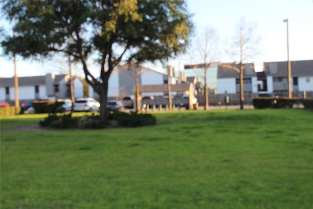 5540 Boca Raton Blvd Unit 174, Fort Worth, TX 76112 - view of green lawn featuring a residential view