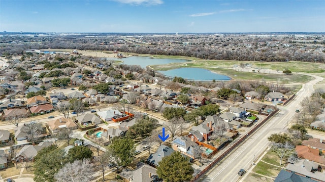 aerial view with a residential view and a water view