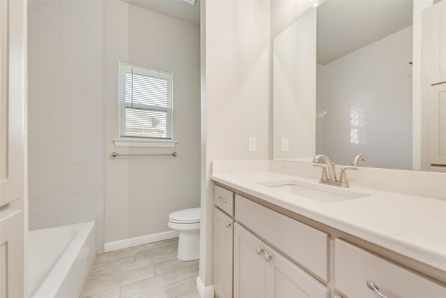 full bathroom with vanity,  shower combination, and toilet