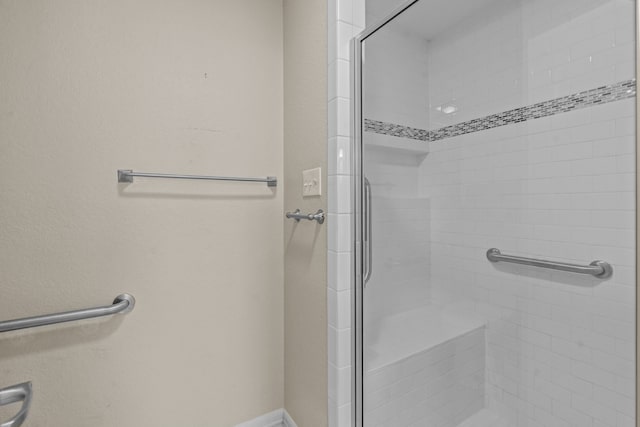 bathroom with a stall shower