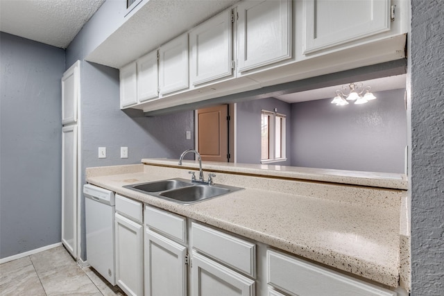 kitchen featuring light tile patterned floors, a sink, white cabinetry, light countertops, and dishwasher