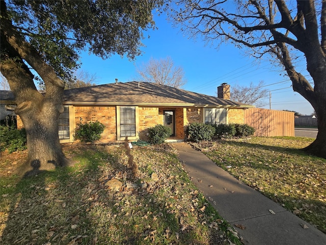 ranch-style house with a front yard