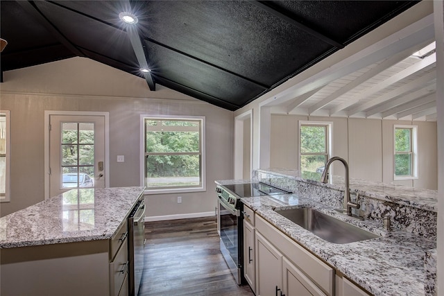 kitchen with white cabinetry, sink, a kitchen island with sink, light stone counters, and stainless steel electric range