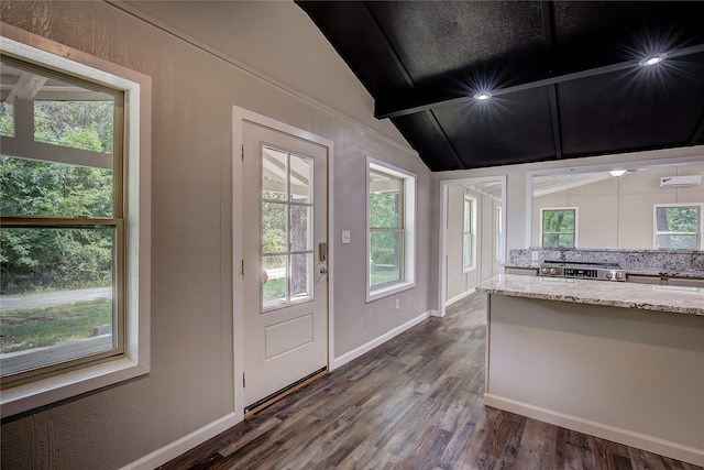 entryway featuring lofted ceiling with beams and dark wood-type flooring