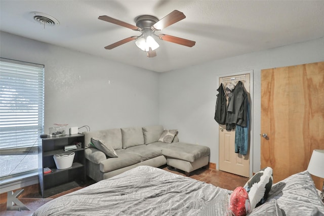 living room featuring ceiling fan