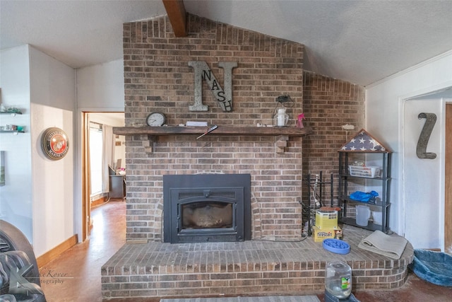 room details featuring beam ceiling, a brick fireplace, and a textured ceiling