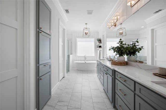 bathroom featuring a soaking tub, marble finish floor, visible vents, and crown molding