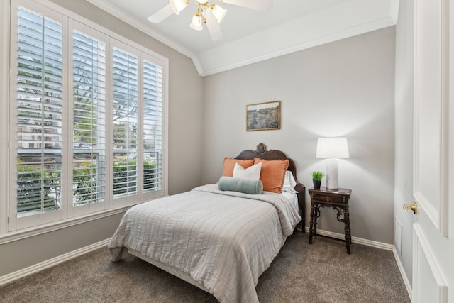 bedroom featuring vaulted ceiling, ceiling fan, carpet flooring, and ornamental molding