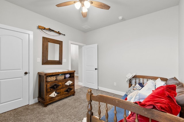 bedroom with ceiling fan and carpet flooring