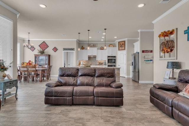 7728 County Road 1205, Rio Vista, TX 76093 - living area featuring light wood-style floors, a chandelier, recessed lighting, crown molding, and baseboards