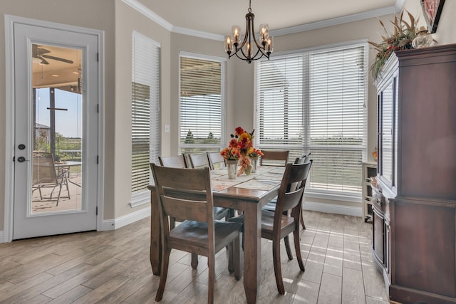 dining room featuring an inviting chandelier and ornamental molding