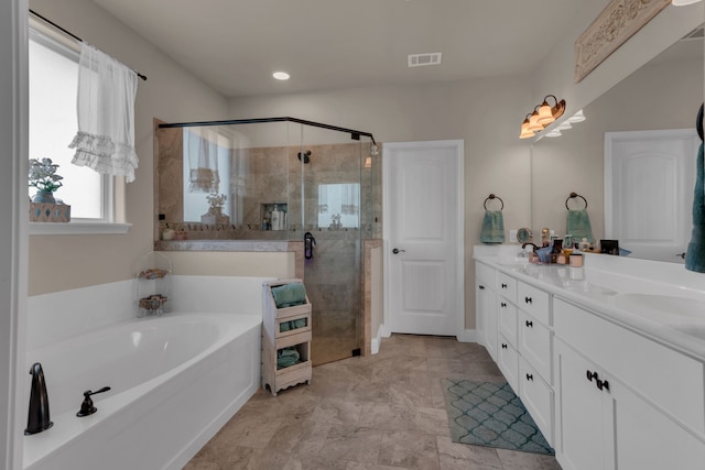 bathroom with plus walk in shower and vanity