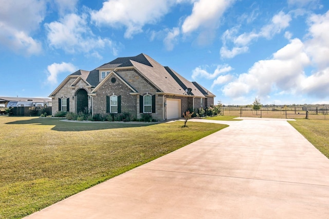 craftsman inspired home featuring a garage and a front yard