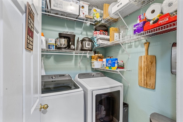 laundry area with washer and clothes dryer