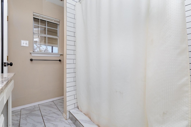 bathroom with vanity and a shower with shower curtain