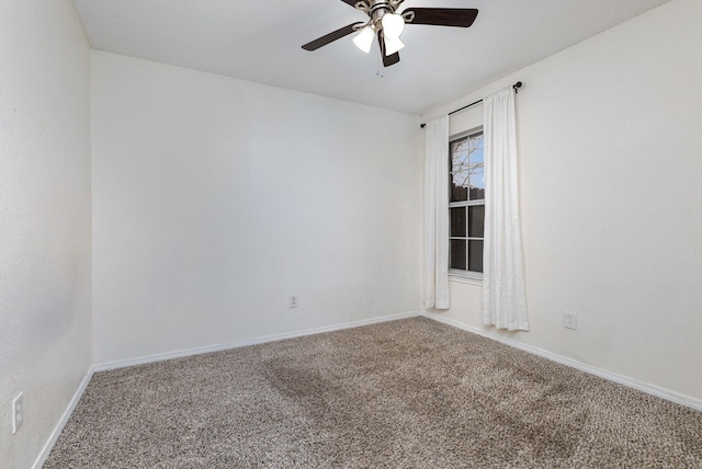 unfurnished room featuring ceiling fan and carpet flooring