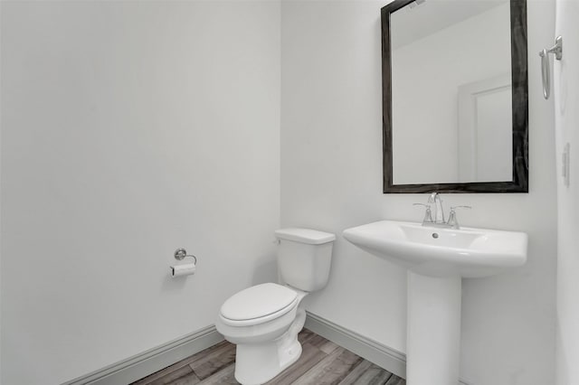 1004 Emil Pl, Allen, TX 75013 - bathroom with toilet and wood finished floors
