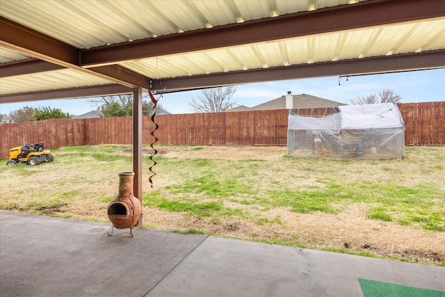 view of yard with a fenced backyard and a patio