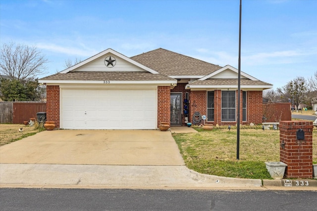 single story home featuring driveway, a shingled roof, an attached garage, a front lawn, and brick siding