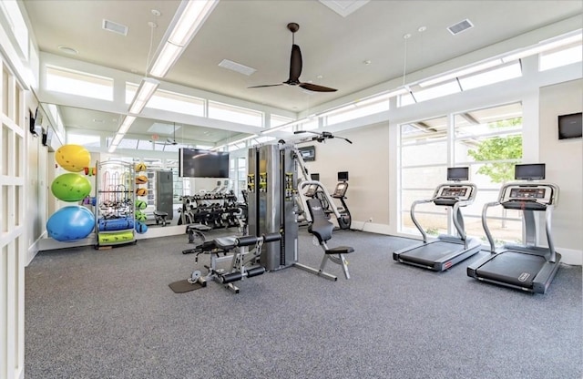 workout area featuring ceiling fan