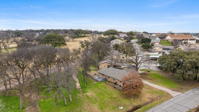 birds eye view of property with a residential view