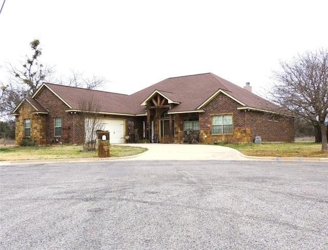 single story home featuring a garage