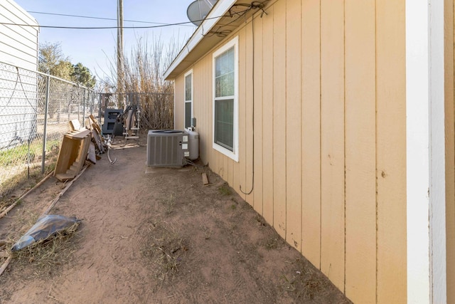 view of yard with central AC