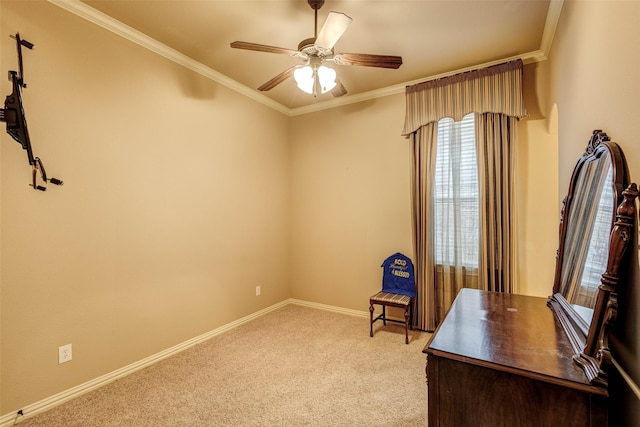 unfurnished office with ornamental molding, light colored carpet, and ceiling fan