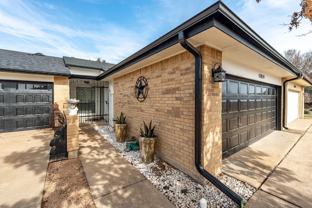 view of side of property with a garage