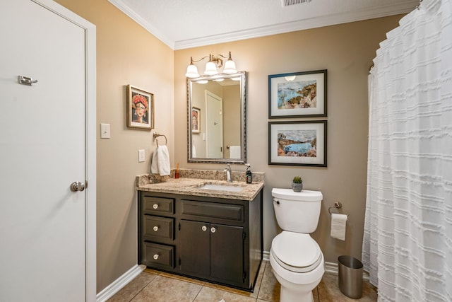 bathroom with ornamental molding, toilet, tile patterned floors, and vanity