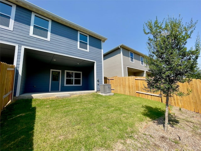 231 Marsh Ln, Princeton, TX 75407 - back of property featuring a patio, cooling unit, and a lawn