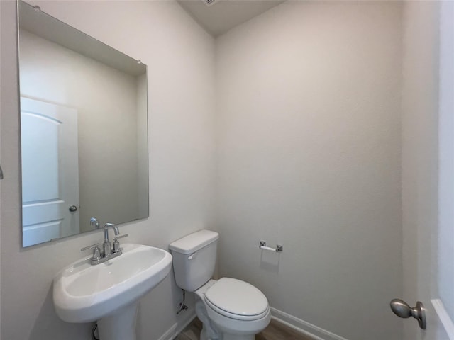 231 Marsh Ln, Princeton, TX 75407 - bathroom featuring sink and toilet
