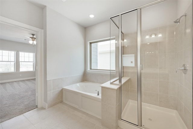 bathroom with tile patterned floors, shower with separate bathtub, and ceiling fan