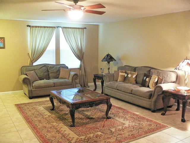 tiled living room featuring ceiling fan