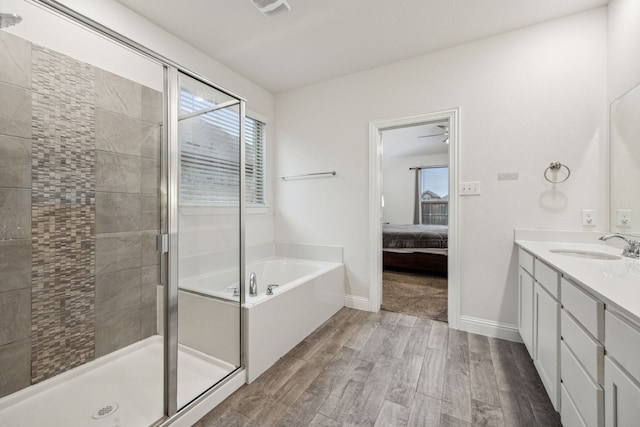 6201 Cheshire St, Celina, TX 76227 - bathroom featuring hardwood / wood-style flooring, vanity, and plus walk in shower