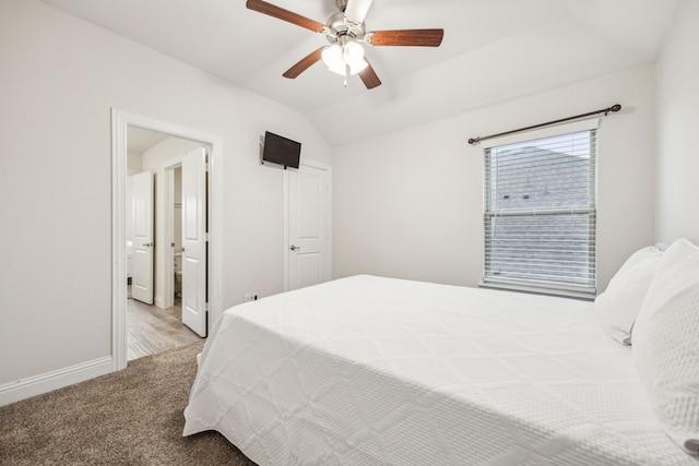 6201 Cheshire St, Celina, TX 76227 - carpeted bedroom featuring connected bathroom, vaulted ceiling, and ceiling fan