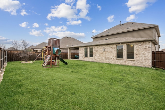 6201 Cheshire St, Celina, TX 76227 - back of house featuring a playground and a lawn