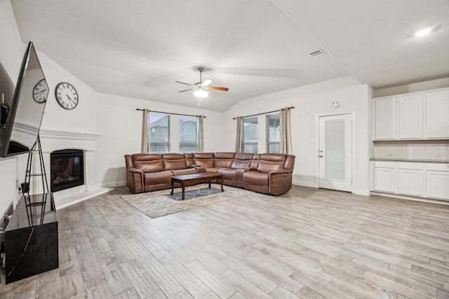 6201 Cheshire St, Celina, TX 76227 - living room with lofted ceiling, ceiling fan, and light wood-type flooring