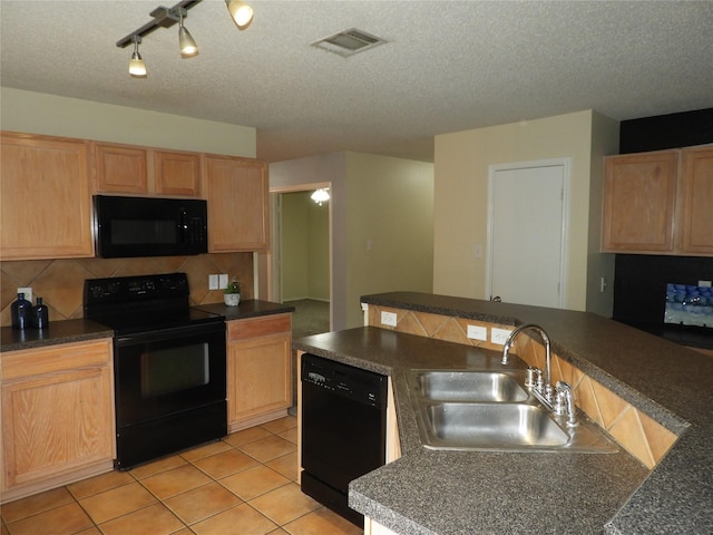 kitchen featuring sink, tasteful backsplash, black appliances, a textured ceiling, and light tile patterned flooring