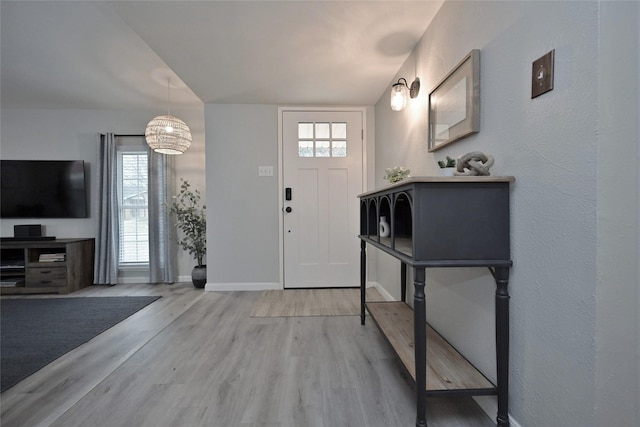 foyer entrance featuring light hardwood / wood-style floors