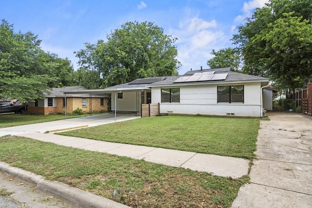 ranch-style house featuring driveway, crawl space, a carport, and a front yard