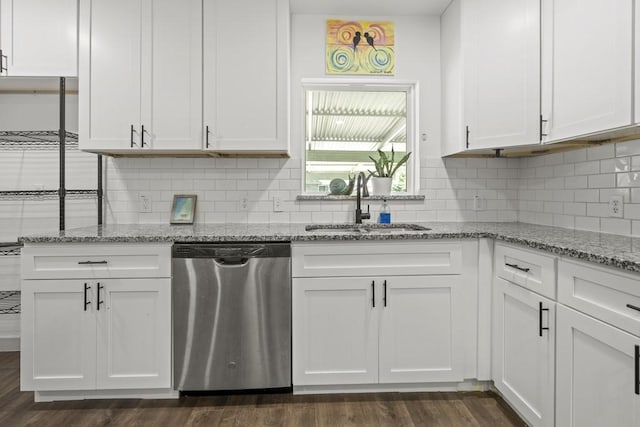 kitchen featuring dishwasher, dark wood-style floors, a sink, and white cabinets