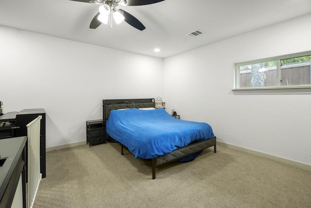 carpeted bedroom with baseboards, visible vents, ceiling fan, and recessed lighting