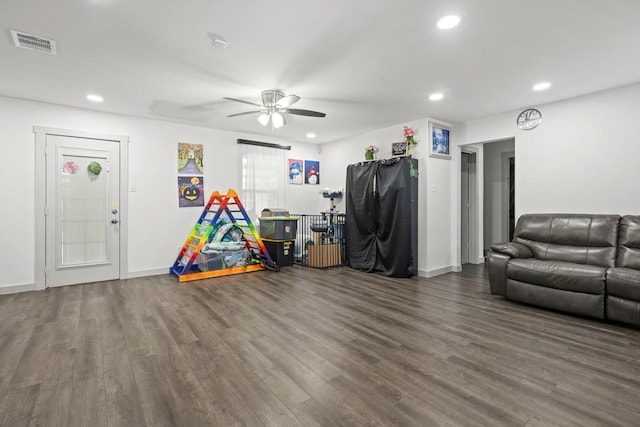 rec room with recessed lighting, dark wood-style flooring, visible vents, and ceiling fan