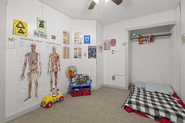 carpeted bedroom with ceiling fan