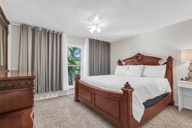 carpeted bedroom with a textured ceiling