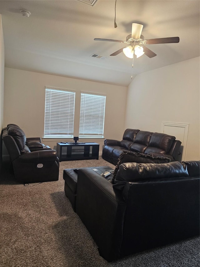 carpeted living room with lofted ceiling and ceiling fan