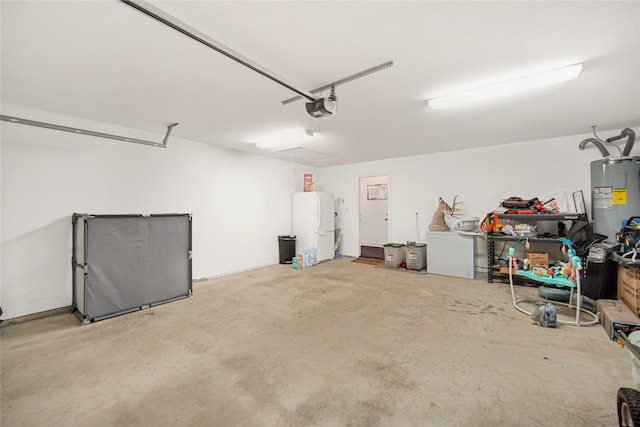 garage featuring refrigerator, stainless steel fridge, white refrigerator, a garage door opener, and electric water heater